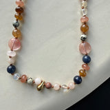 Hand-knotted multi bead necklace with teardrop charm