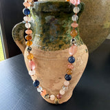 Hand-knotted multi bead necklace with teardrop charm