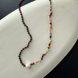 Red garnet, pearl, and multi coloured beaded necklace