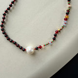 Red garnet, pearl, and multi coloured beaded necklace